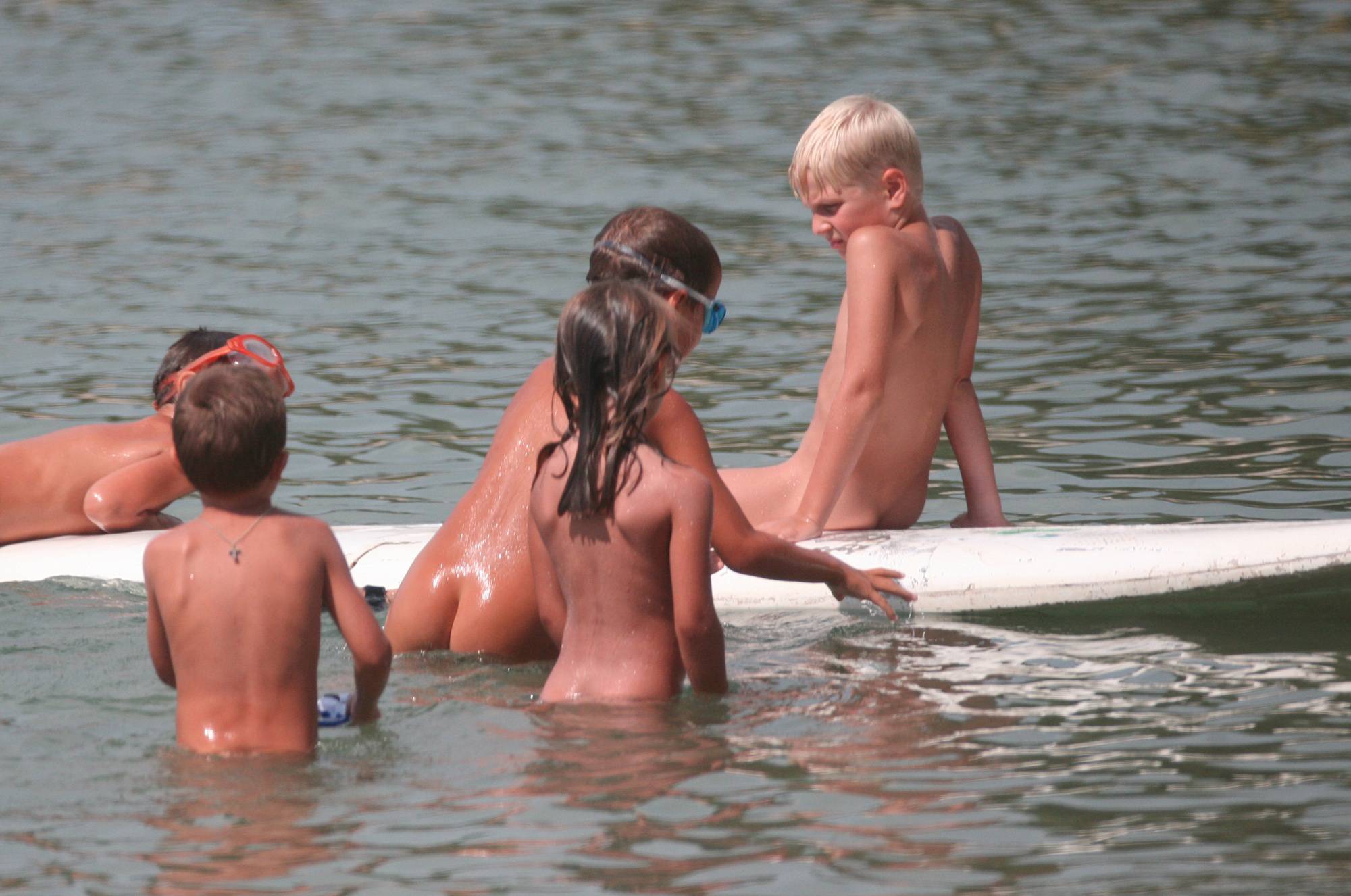 Nudist Gallery Several Kids On Surfboard - 2