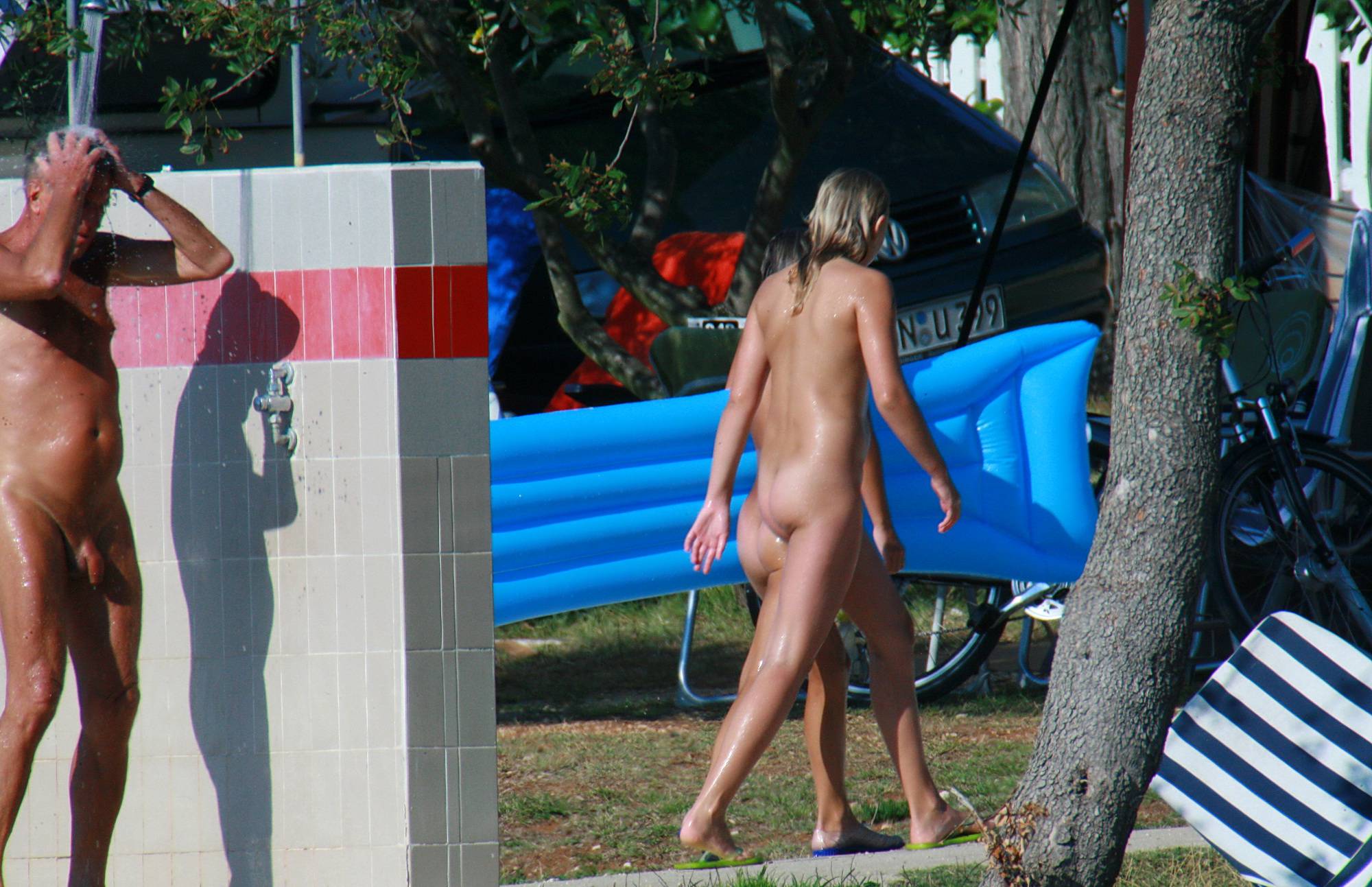 Nudist Photos Shower By The Veranda - 1