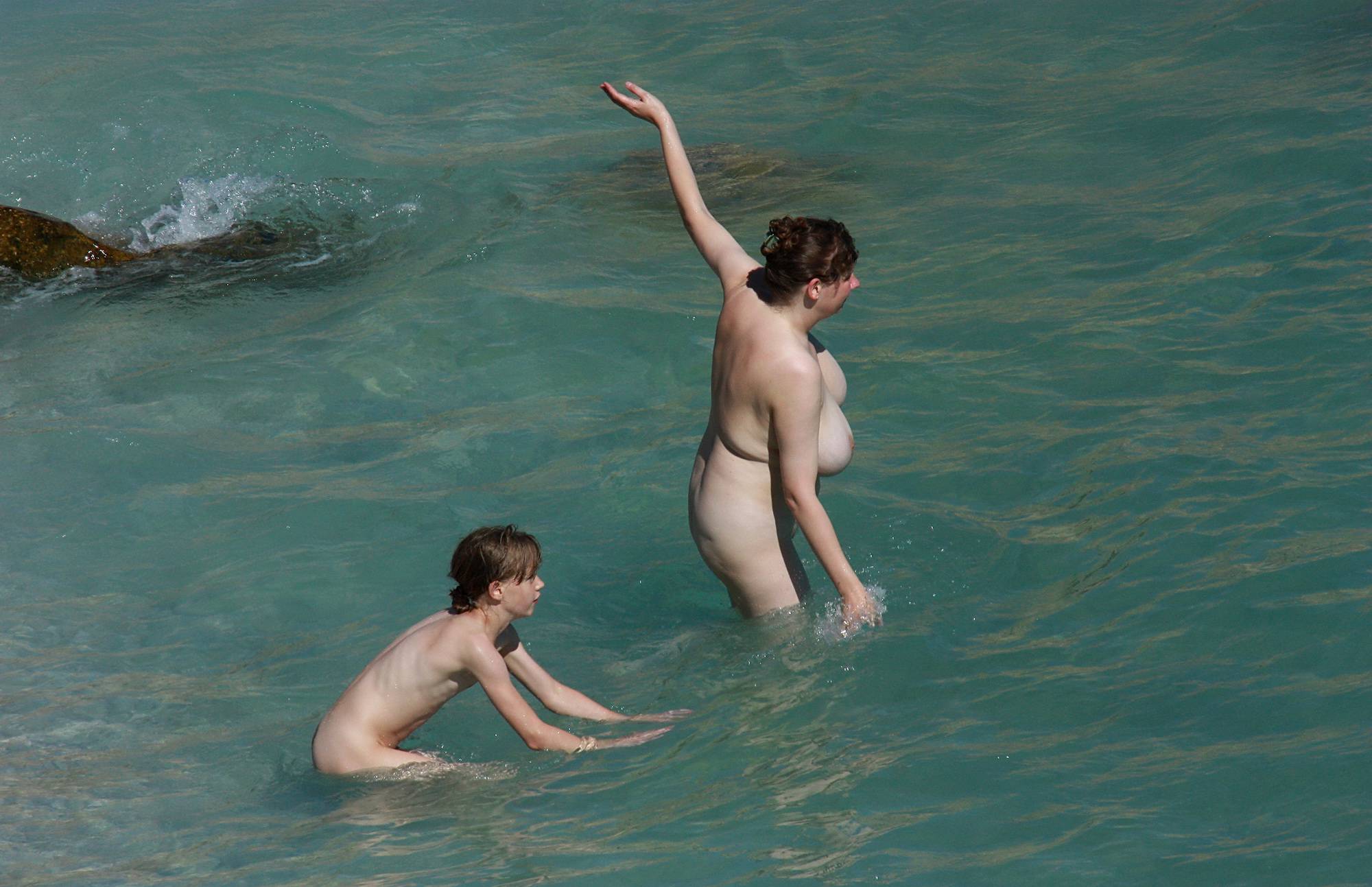 Nudist Pics Wading Through The Sea - 2